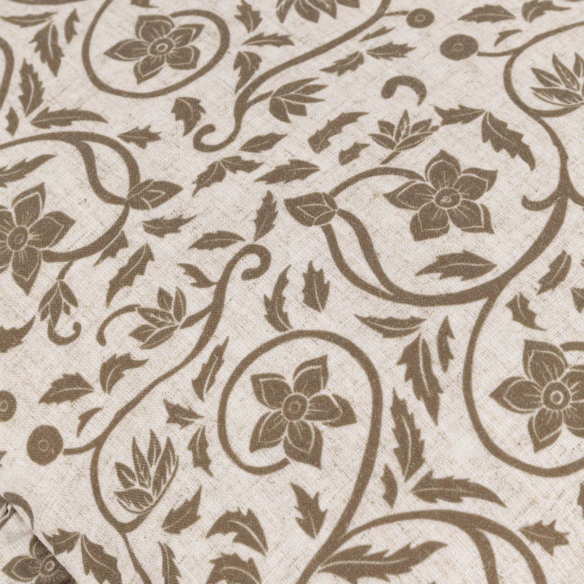 Beige linen cushion cover with filigree print and ruffle accents from Riva Home, soft furnishings for elegant home decor.