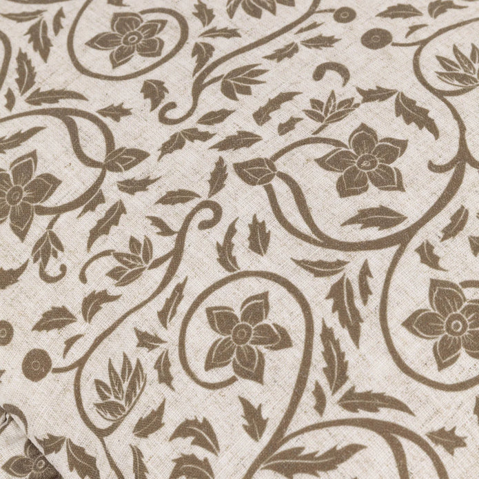 Beige linen cushion cover with filigree print and ruffle accents from Riva Home, soft furnishings for elegant home decor.