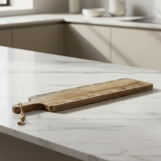 Etched Serving Tapas Board, slim etched wooden serving board on a kitchen counter