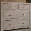 Wickham Rattan Large Rectangular Chest Of Drawers, angled close-up of the woven chest and round knobs