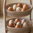 Wickham Rattan Two Tier Egg Basket, close-up of eggs on both woven tiers