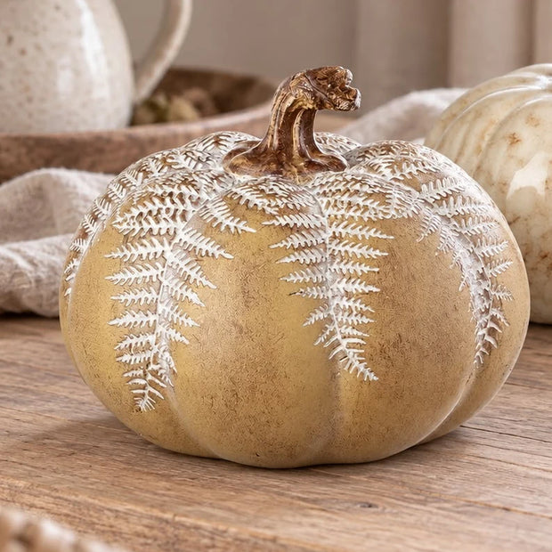 Fern Leaf Design Topped Pumpkin, ochre pumpkin with white fern decoration in close view