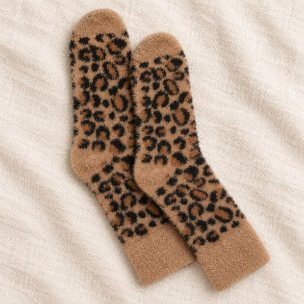 Tan Fluffy Leopard Print Socks, tan leopard socks arranged on cream linen