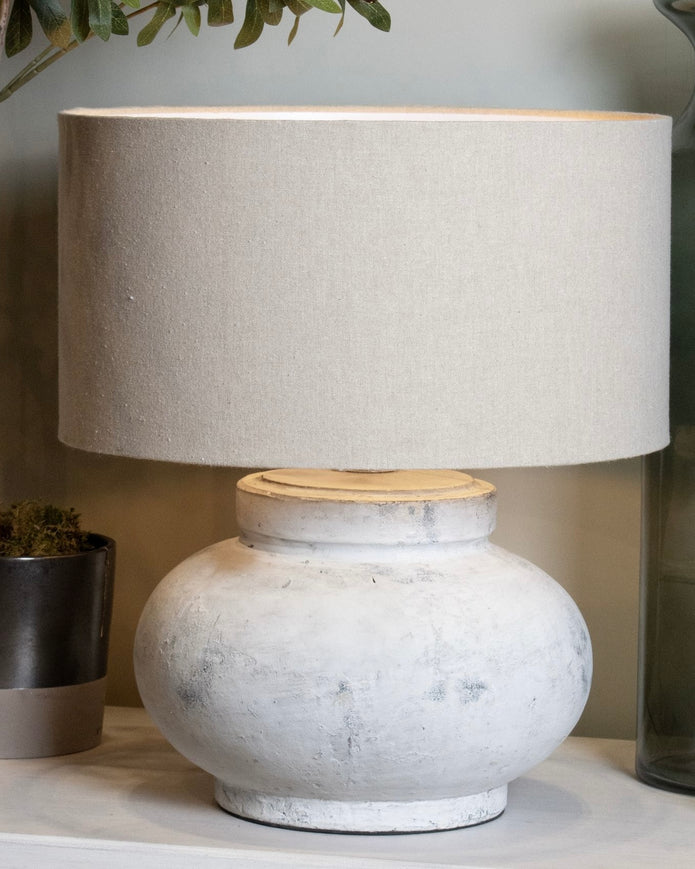 Hill Interiors Darcy squat round stone lamp, stylish lighting fixture with a smooth, rounded design and textured stone finish.