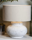 Hill Interiors Darcy squat round stone lamp, stylish lighting fixture with a smooth, rounded design and textured stone finish.