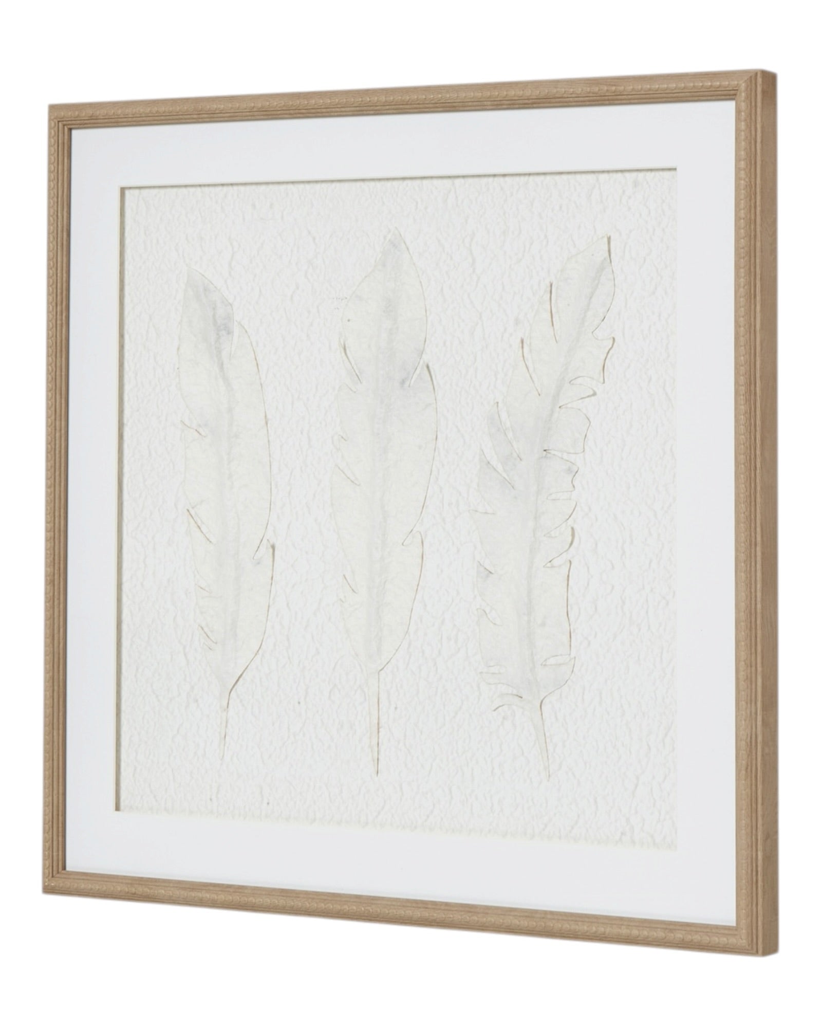 White feather wall art in a frame, designed by Hill Interiors, perfect for elegant home decor and wall decoration.