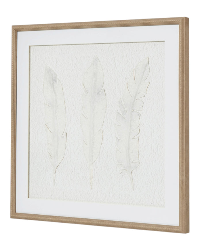 White feather wall art in a frame, designed by Hill Interiors, perfect for elegant home decor and wall decoration.