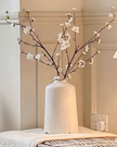 White glazed Liv vase by Hill Interiors featuring a sleek, modern design suitable for home decor.