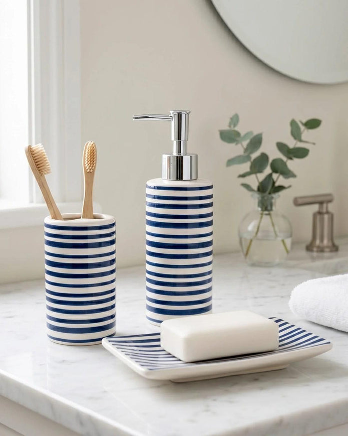 Blue striped soap dispenser bottle from Candlelight Products Ltd, stylish home decor accessory with a modern design.