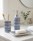 Blue striped soap dispenser bottle from Candlelight Products Ltd, stylish home decor accessory with a modern design.