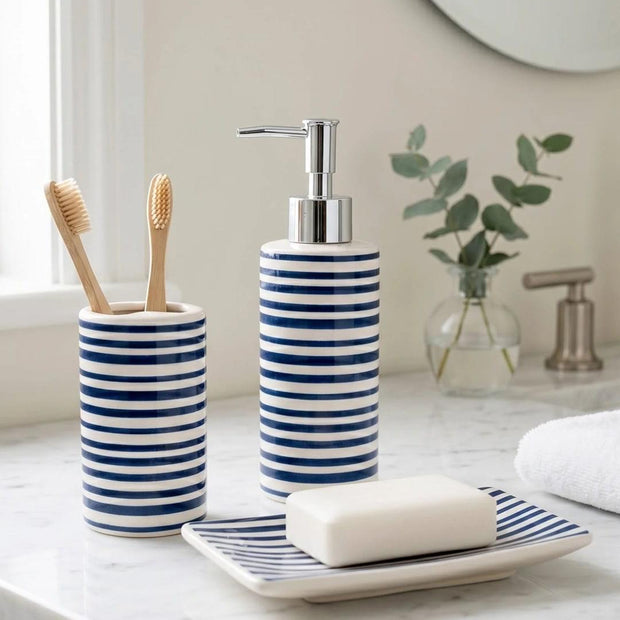 Blue striped soap dispenser bottle from Candlelight Products Ltd, stylish home decor accessory with a modern design.