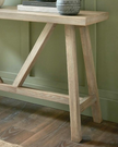 Wooden console table from Hill Interiors' Haldon Collection, showcasing a sleek, modern design perfect for entryways or living rooms.