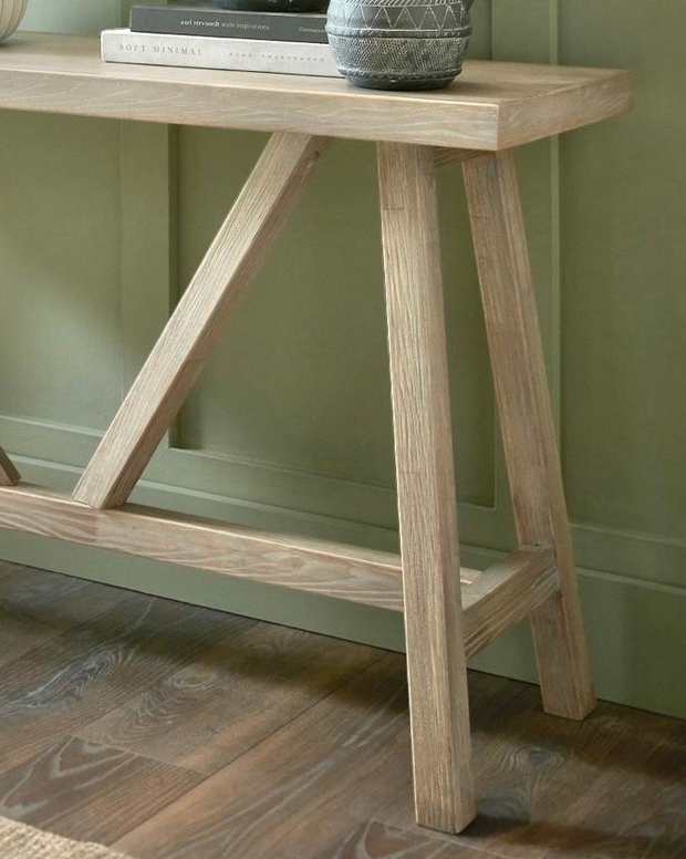 Wooden console table from Hill Interiors' Haldon Collection, featuring a sleek design and sturdy construction for entryways or living rooms.
