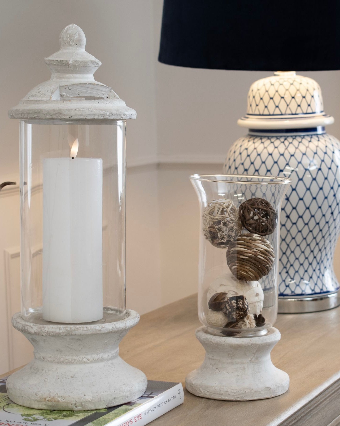 Stone lidded hurricane candle lantern by Hill Interiors, featuring a rustic design and glass windows for home decor.