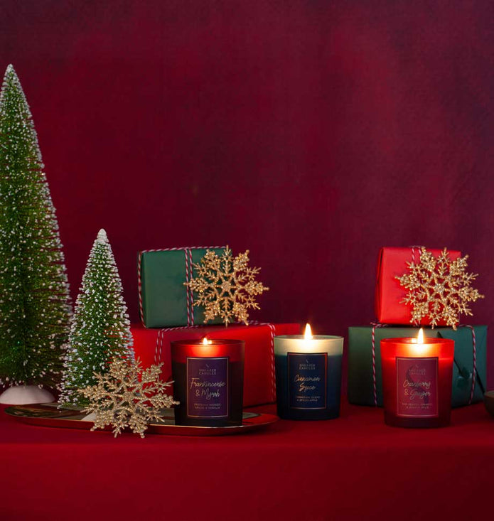 Shearer Candles Frankincense and Myrrh Christmas jar candle with festive holiday design and warm glowing wick.