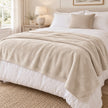 Cream Luxury Snuggle Blanket Throw, cream throw spread over a neutral bed