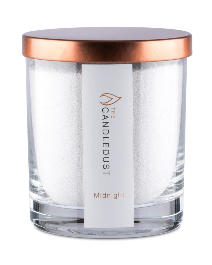 White scented candle in a sand jar from The Candledust Midnight home fragrance kit, showcasing a minimalist design.