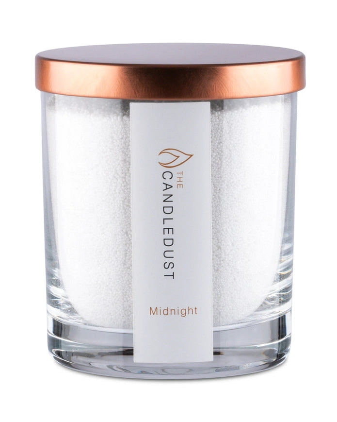White scented candle in a sand jar from The Candledust Midnight home fragrance kit, showcasing a minimalist design.