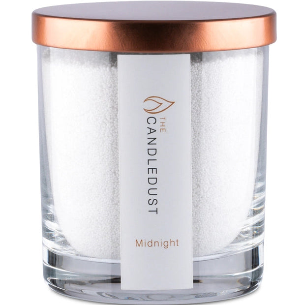 White scented candle in a sand jar from The Candledust Midnight home fragrance kit, showcasing a minimalist design.