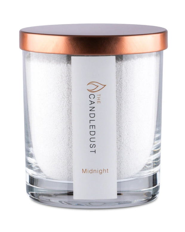 White scented candle in a sand jar from The Candledust Midnight home fragrance kit, showcasing a minimalist design.