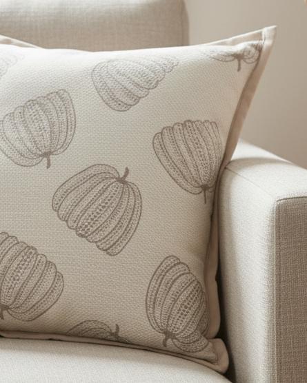 Neutral Beige Printed Pumpkin Cushion Cover, close view of the repeated beige pumpkin outlines