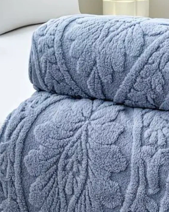 Ocean blue damask pattern fleece throw from Starlight Express, soft and cozy furnishings for added warmth and style.