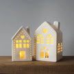 White heart-shaped LED light up Christmas house by Gainsborough Giftware x Portland Living, with illuminated heart detail.
