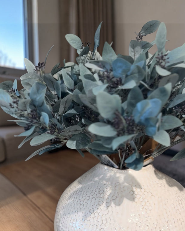 Artificial Seaded Eucalyptus stem from Hill Interiors, showcasing realistic green eucalyptus leaves and seed details.