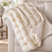 Cream Luxury Faux Fur Blanket Throw, close-up of the cream faux fur throw and smooth reverse on a sofa