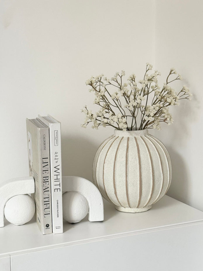 Decorative vase with globe and striped pattern, ideal for home décor from Hill Interiors.