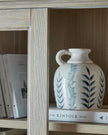 Sliding glass dresser top from Hill Interiors' Delphine Collection, showcasing sleek glass and modern furniture design.