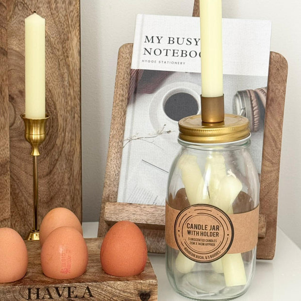 Wooden Recipe Book Holder, wooden recipe stand beside an egg holder and candle jar