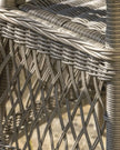 Natural rattan Menton two-seat bistro set by Gallery Direct, includes round table and woven chairs for garden outdoor seating.