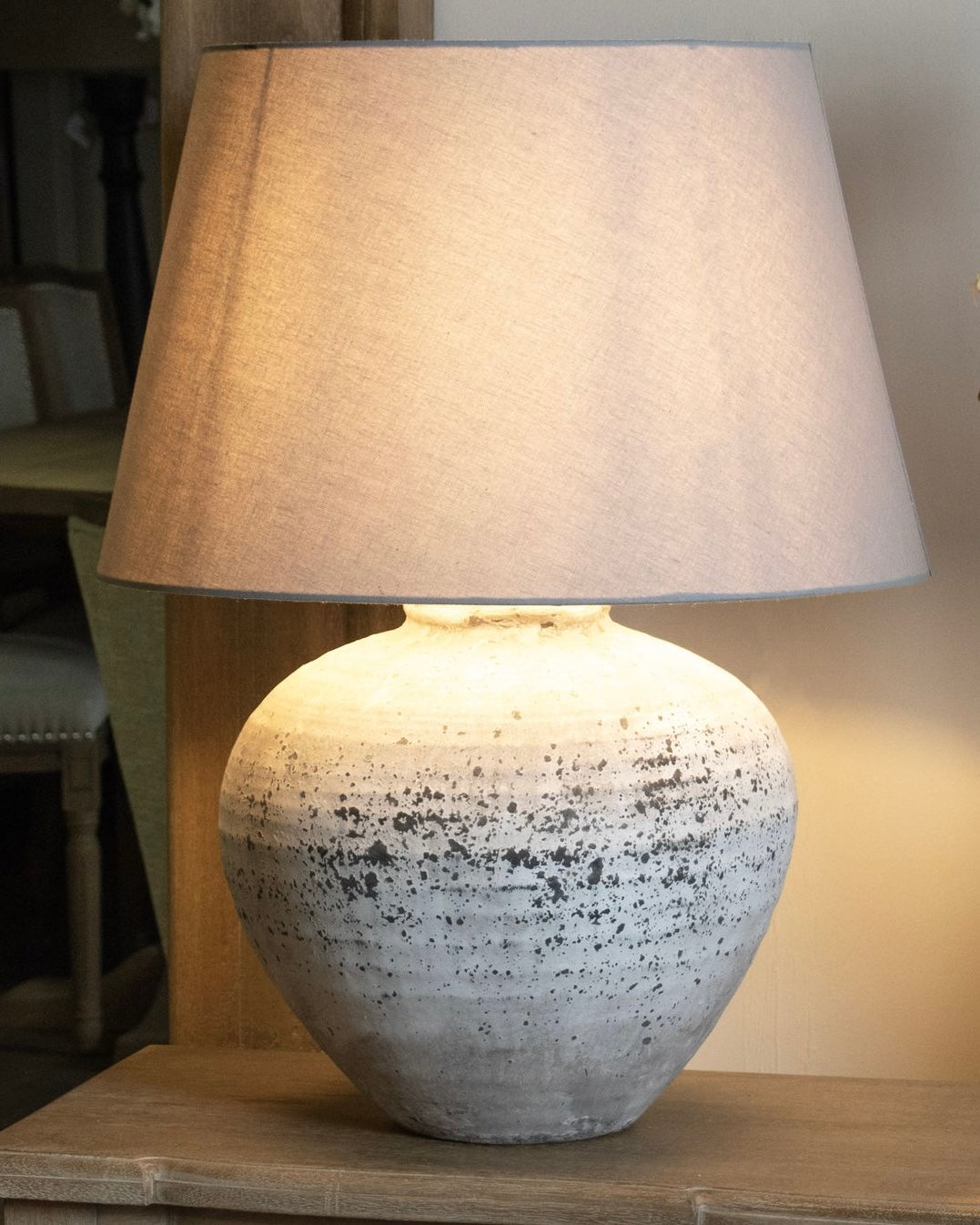 Large ribbed stone lamp by Hill Interiors, modern lighting fixture with textured stone finish for stylish interior illumination.