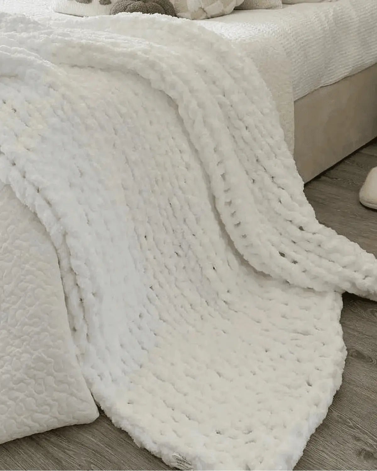 White chenille chunky knit blanket throw by Starlight Express, soft and cozy textured soft furnishings for home decor.