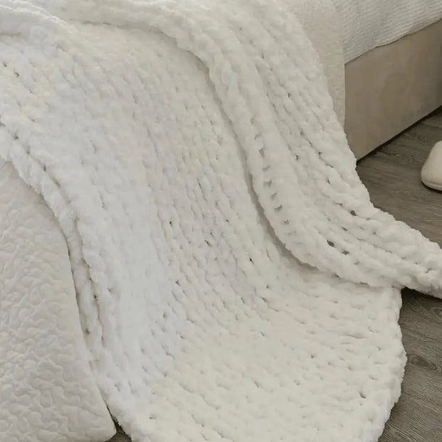 White chenille chunky knit blanket throw by Starlight Express, soft and cozy textured soft furnishings for home decor.
