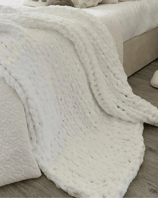 White chenille chunky knit blanket throw by Starlight Express, soft and cozy textured soft furnishings for home decor.