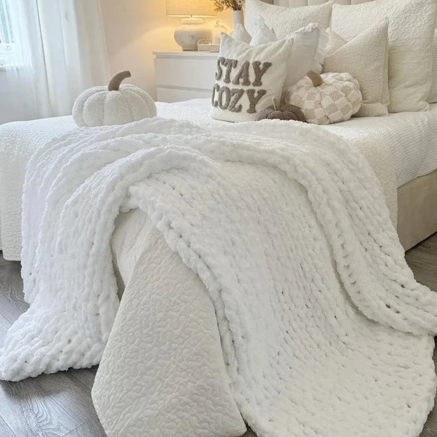 White chenille chunky knit blanket throw by Starlight Express, soft and cozy for living room or bedroom decor.