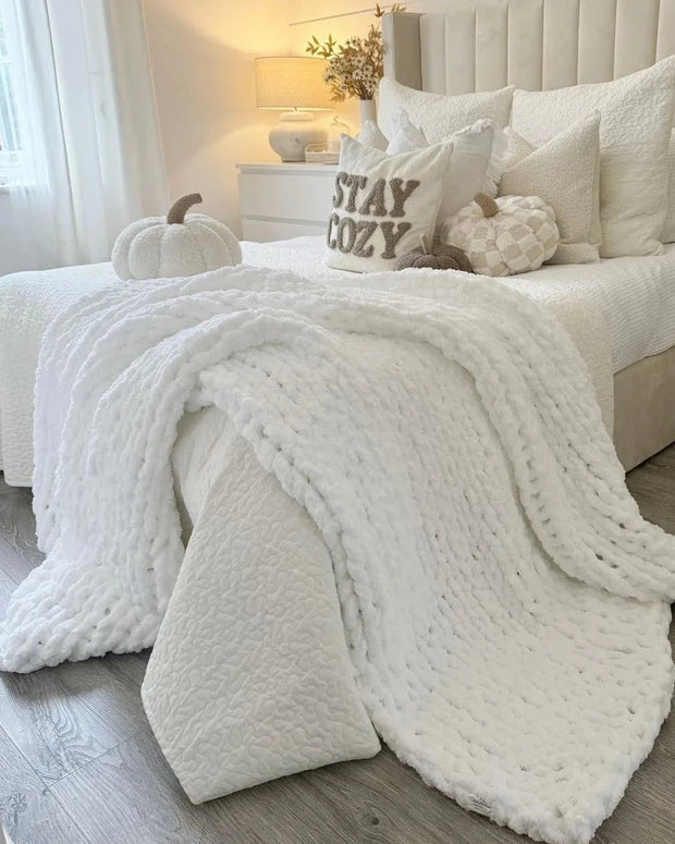 White chenille chunky knit blanket throw by Starlight Express, soft and cozy for living room or bedroom decor.