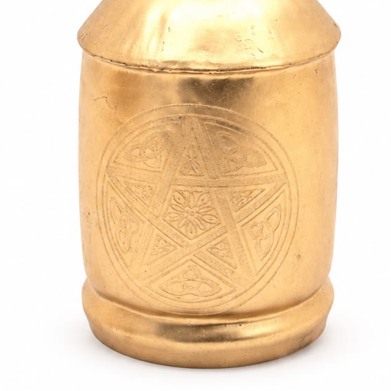 Large Brass Gold Cow Bell On Rope, close-up of the engraved circular pattern on the bell