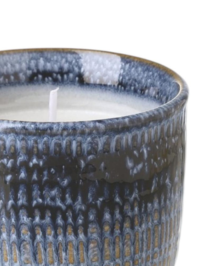 Navy blue ceramic candle from Heaven Sends, a stylish home décor piece with a smooth finish and decorative design.