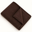 Chocolate Brown Luxury Snuggle Blanket Throw, folded chocolate brown throw showing its corner on white