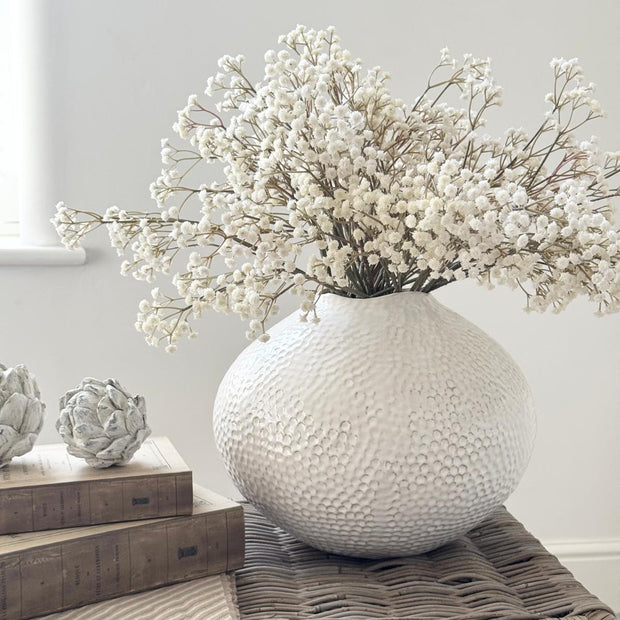 Zaffera Ivory Caldron Textured Vase, ivory textured vase with white branches on a rustic table