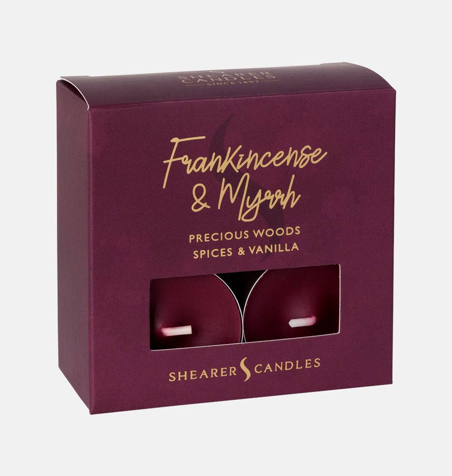 Set of Shearer Candles Frankincense and Myrrh Christmas tealights in glass holders, perfect for holiday ambiance.