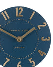 Thomas Kent Mulberry mantle clock in midnight blue with white clock face and black hands, decorative wood frame.