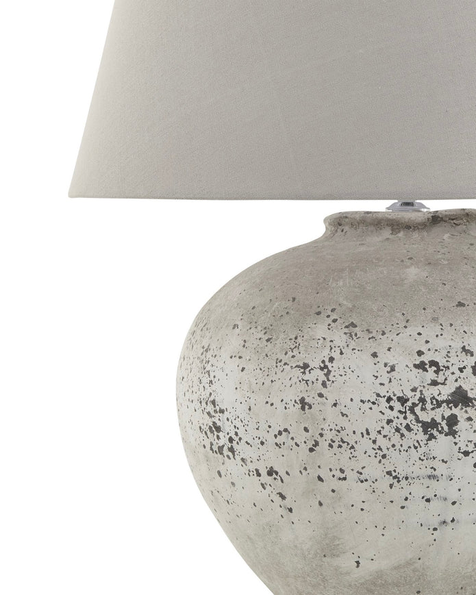 Large ribbed stone lamp by Hill Interiors, stylish lighting fixture with textured surface and a modern design.