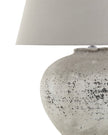 Large ribbed stone lamp by Hill Interiors, stylish lighting fixture with textured surface and a modern design.