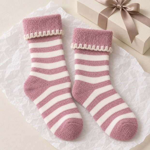 Super Cosy Fluffy Cuff Socks - Pink Stripe, pink and cream striped socks beside a wrapped gift