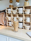 Wooden mug display shelf unit by Starlight Express, ideal for kitchen and dining room organization with multiple hooks.