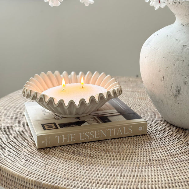 Wikholmform neutral ceramic glazed ribbed wavy bowl for home decor, featuring a textured, wavy design in neutral tones.